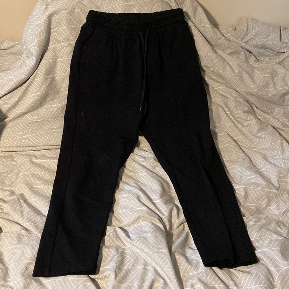 Black tracksuit.